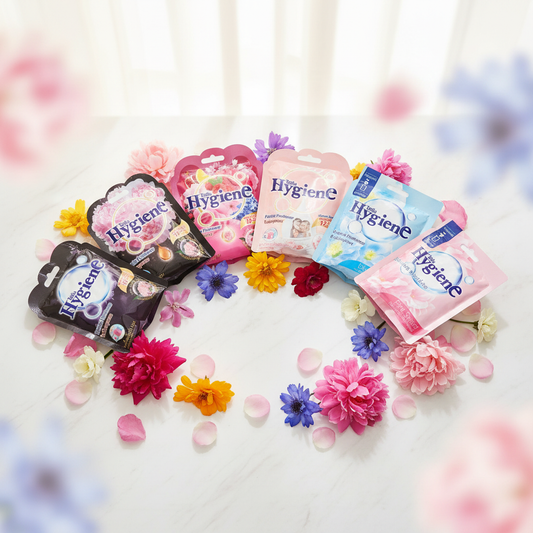 Hygiene Fabric Freshener scent sachets all variants hero product image with colourful flowers on marble